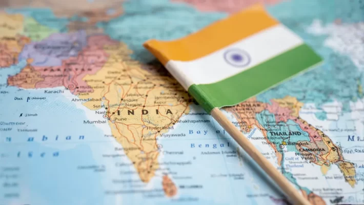 Indian flag placed on a world map highlighting India