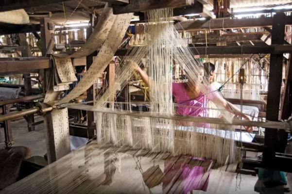 traditional textile weaving and fabric quality control process in manufacturing