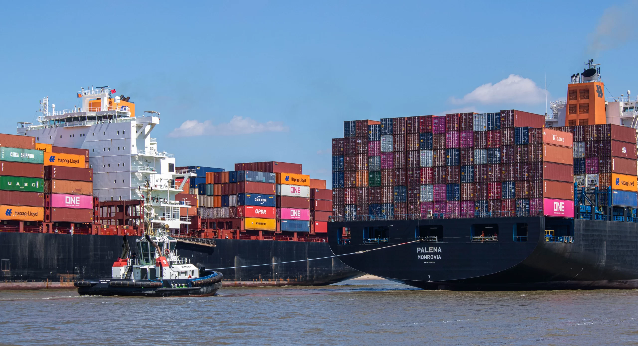 Container ship carrying international cargo, representing global sourcing strategy, supplier sourcing, and buying office operations across Asia and international markets.