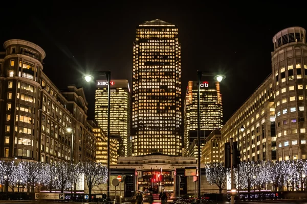 Modern business district symbolising strategic sourcing decisions, comparing buying office models and wholly owned entities for global procurement and supply chain management.