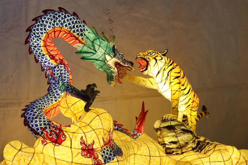 Dragon and tiger artwork representing Asian markets, China sourcing and global supply chain strategy.